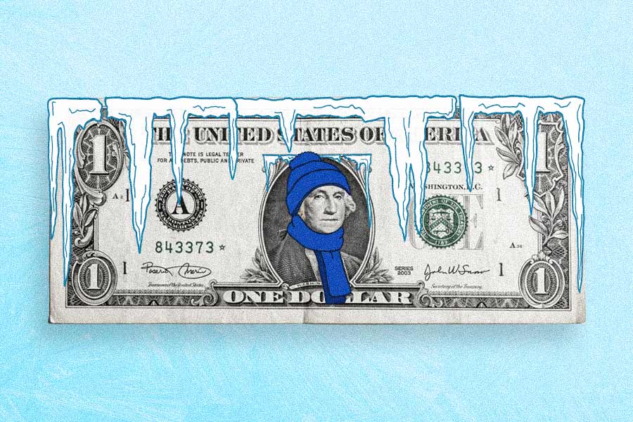 U.S. dollar with ice on it. George Washington wearing beanie and scarf.